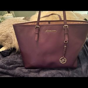 Purple Michael Kira laptop bag